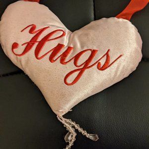 Valentine's day heart door hanger with "hugs"